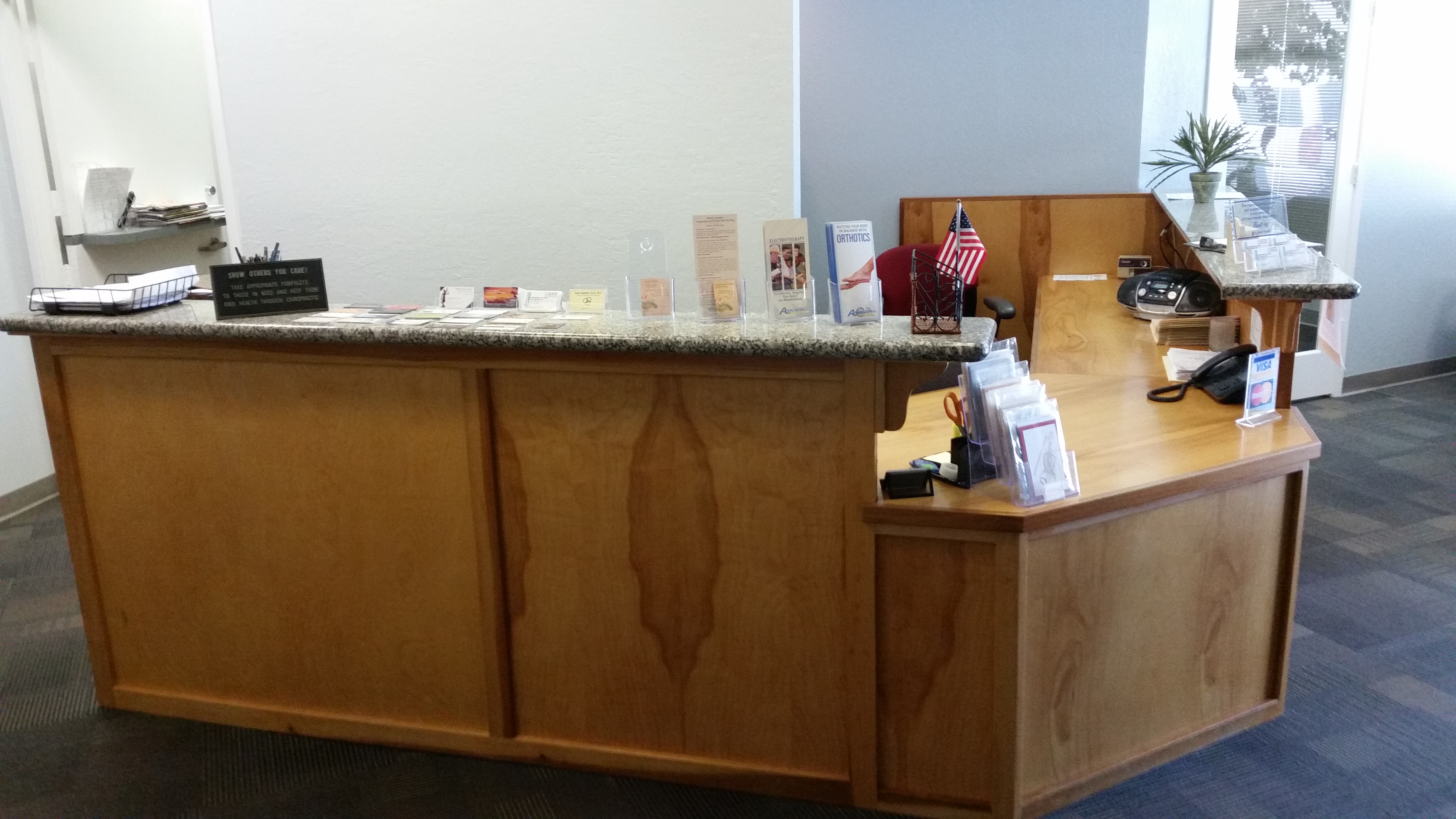 front view of Patient Receptionist Desk - First Chiropractic - Gilroy, CA (408)-848-6222